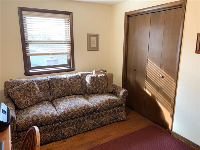 3241 Ridgeway Road Greensburg, PA 15601 - Photo 17 of 25 #3 bedroom with neutrally painted walls and hardwood flooring.