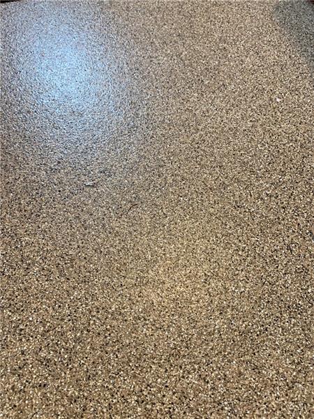 3241 Ridgeway Road Greensburg, PA 15601 - Photo 25 of 25 Epoxy flooring in the large 2 car garage. Side door in garage leads to side/backyard.