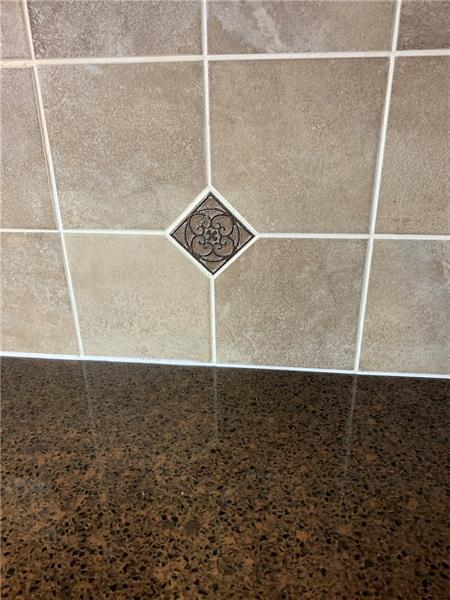 3241 Ridgeway Road Greensburg, PA 15601 - Photo 6 of 25 granite counter tops and tiled backsplash in the eat in kitchen