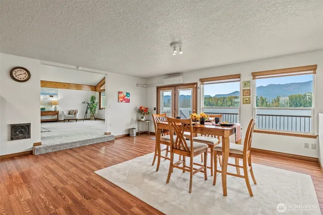 a kitchen with stainless steel appliances granite countertop a stove a sink dishwasher and a refrigerator