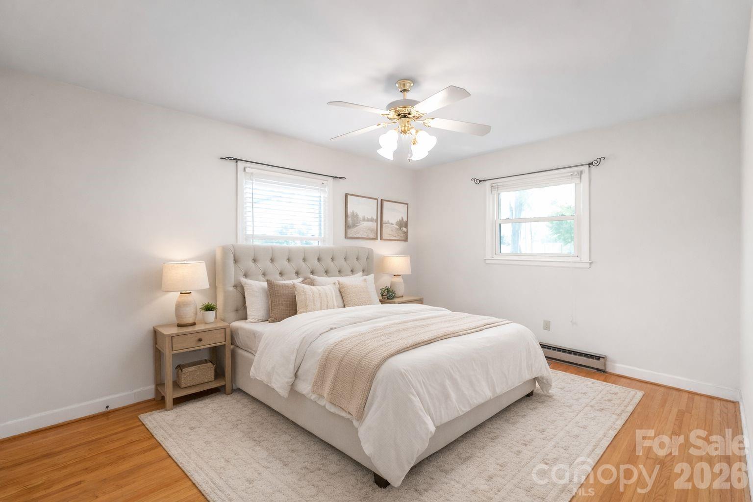 105 West Sunset Drive Locust, NC 28097 - Photo 12 of 24 a bedroom with a bed and a window