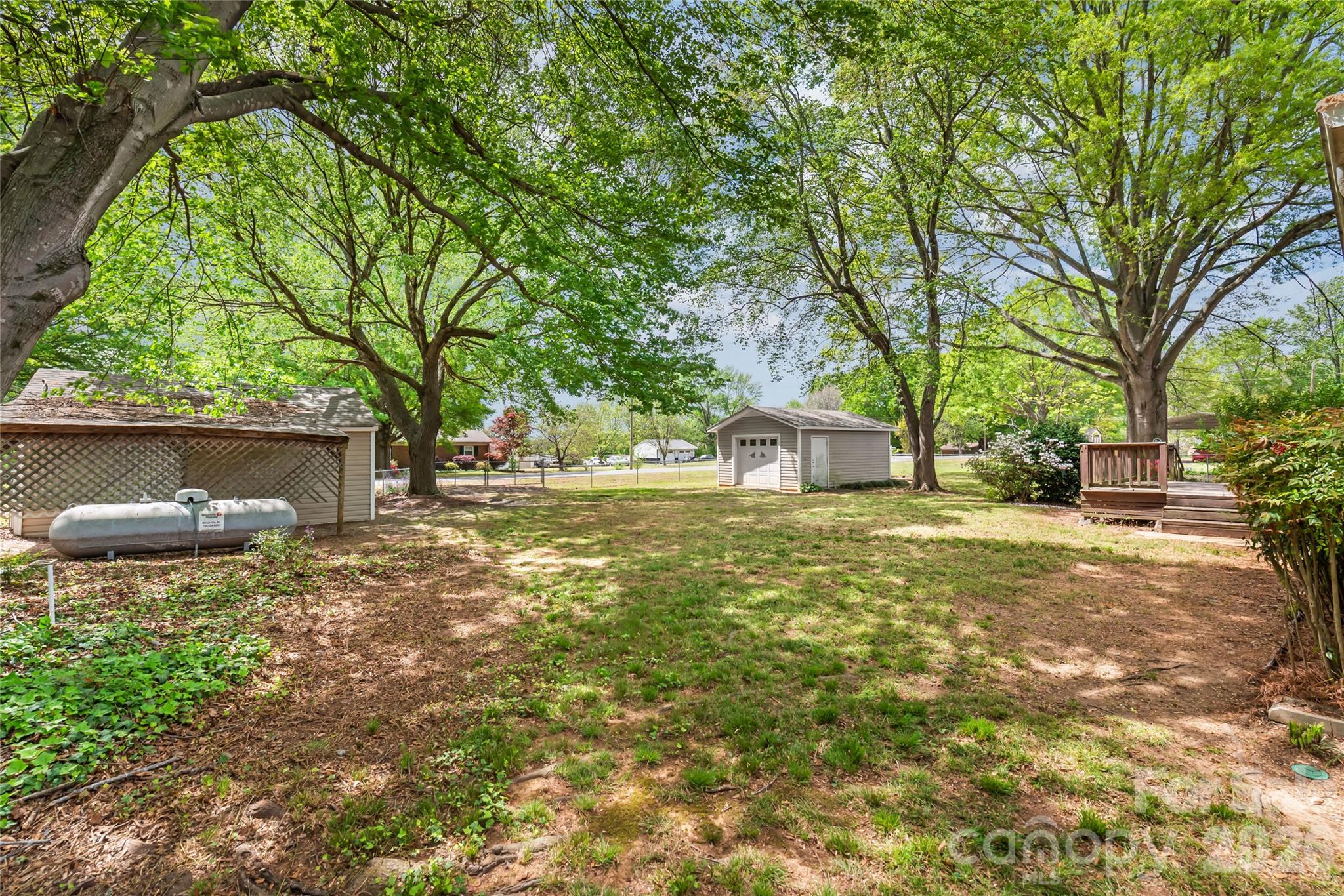105 West Sunset Drive Locust, NC 28097 - Photo 21 of 24 a front view of a house with a yard