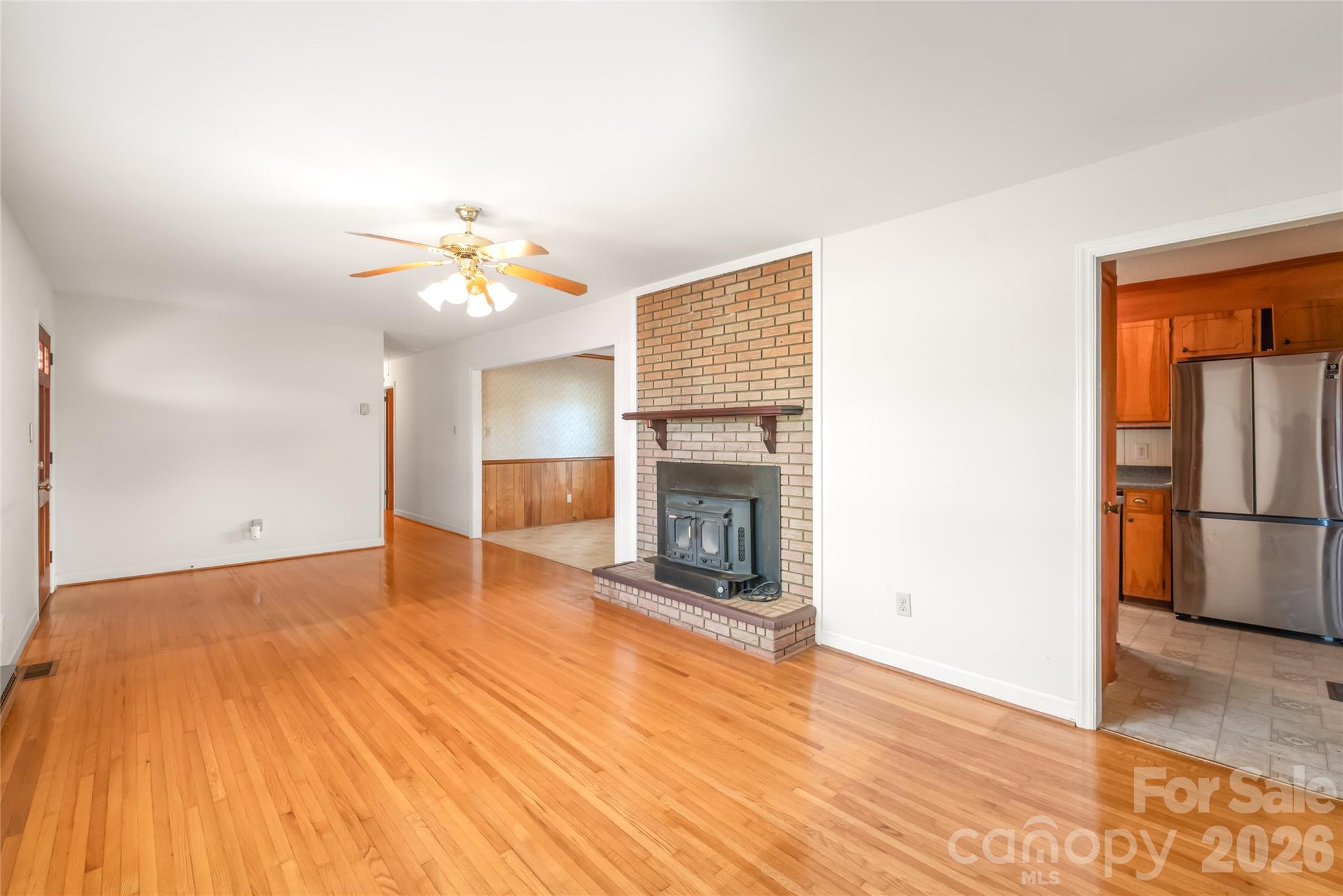105 West Sunset Drive Locust, NC 28097 - Photo 6 of 24 a view of a livingroom with a fireplace