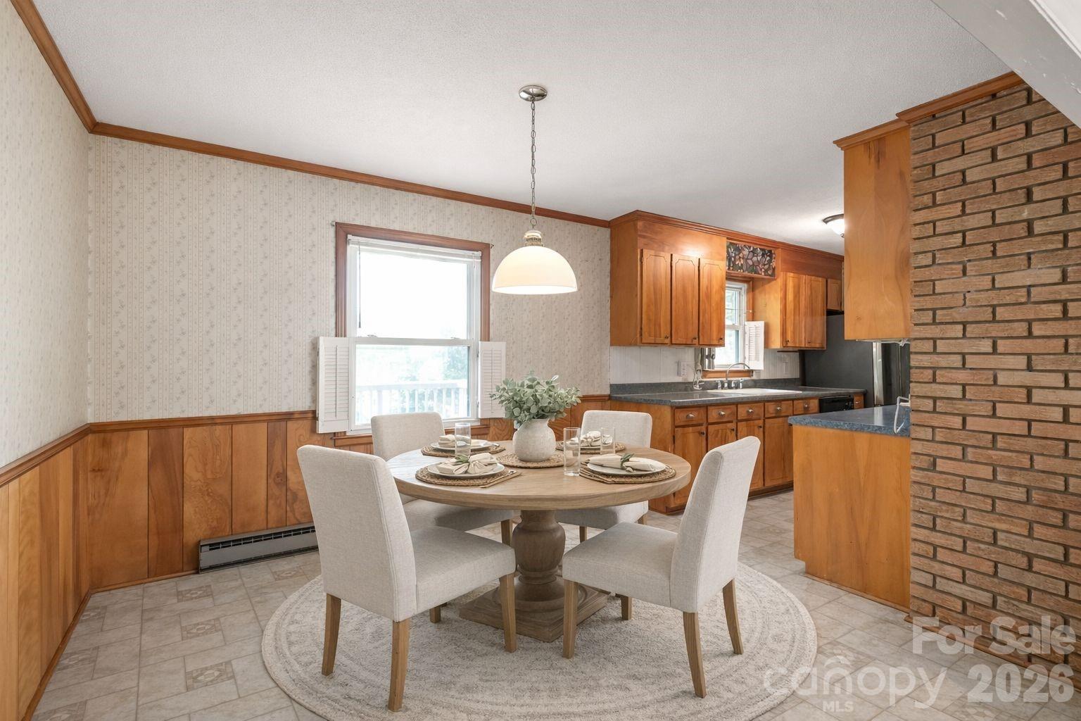 105 West Sunset Drive Locust, NC 28097 - Photo 7 of 24 a dining room with furniture and window