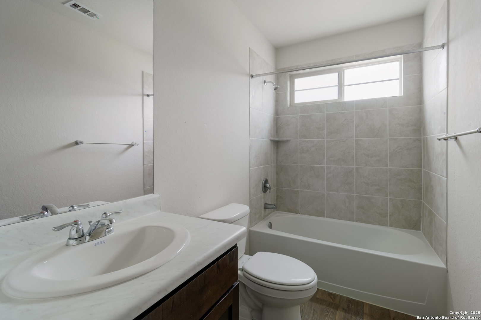5965 Kendall Prairie Converse, TX 78109 - Photo 12 of 14 a bathroom with a sink toilet and shower