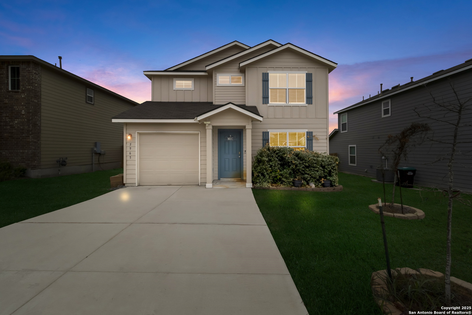 5965 Kendall Prairie Converse, TX 78109 - Photo 2 of 14 a front view of a house with garden
