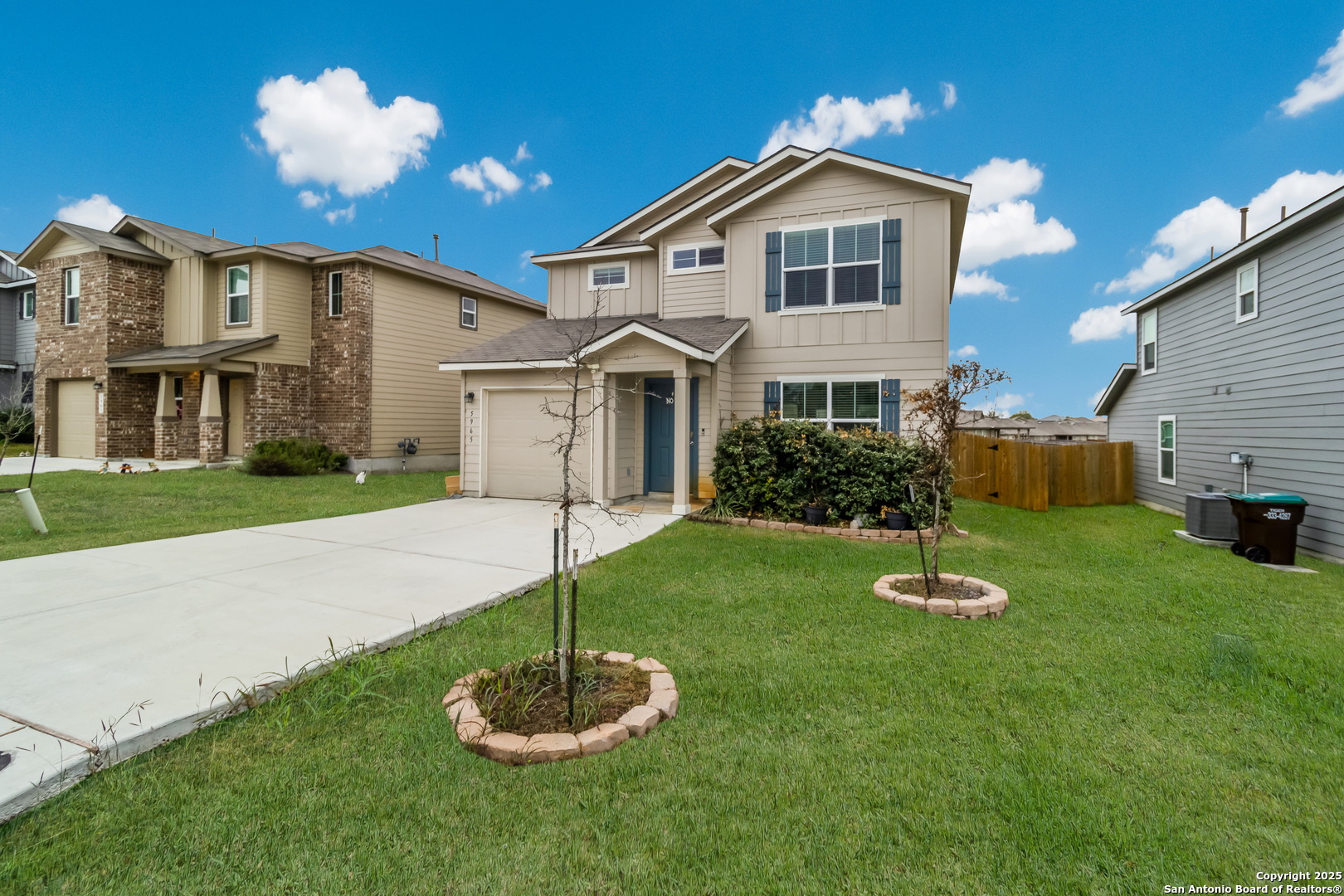 5965 Kendall Prairie Converse, TX 78109 - Photo 3 of 14 a front view of a house with a yard