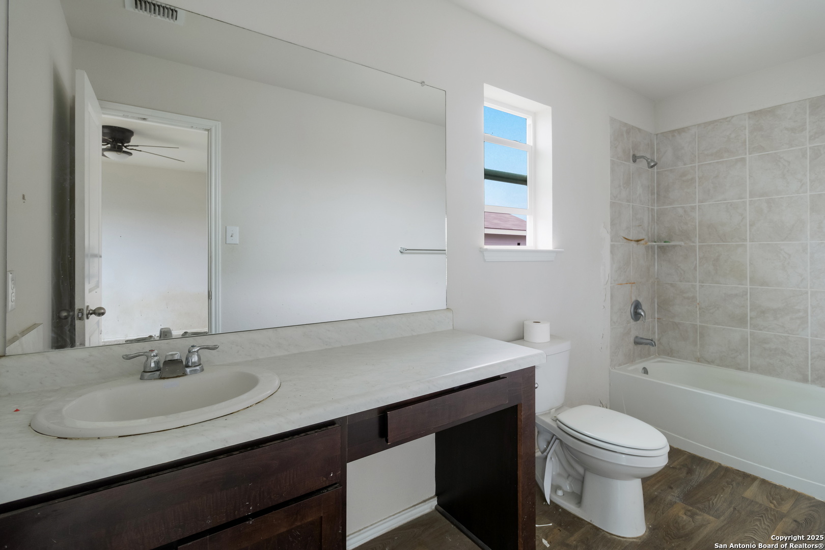 5965 Kendall Prairie Converse, TX 78109 - Photo 10 of 14 a bathroom with a sink a toilet and shower