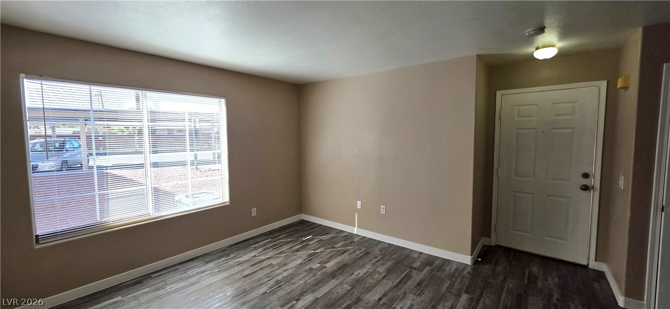1830 North Pecos Road, Unit 142 Las Vegas, NV 89115 - Photo 4 of 19 Sun-filled interior with resilient flooring and ample space for versatile living arrangements.