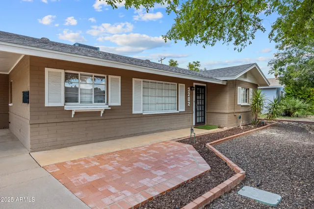 a front view of house with yard