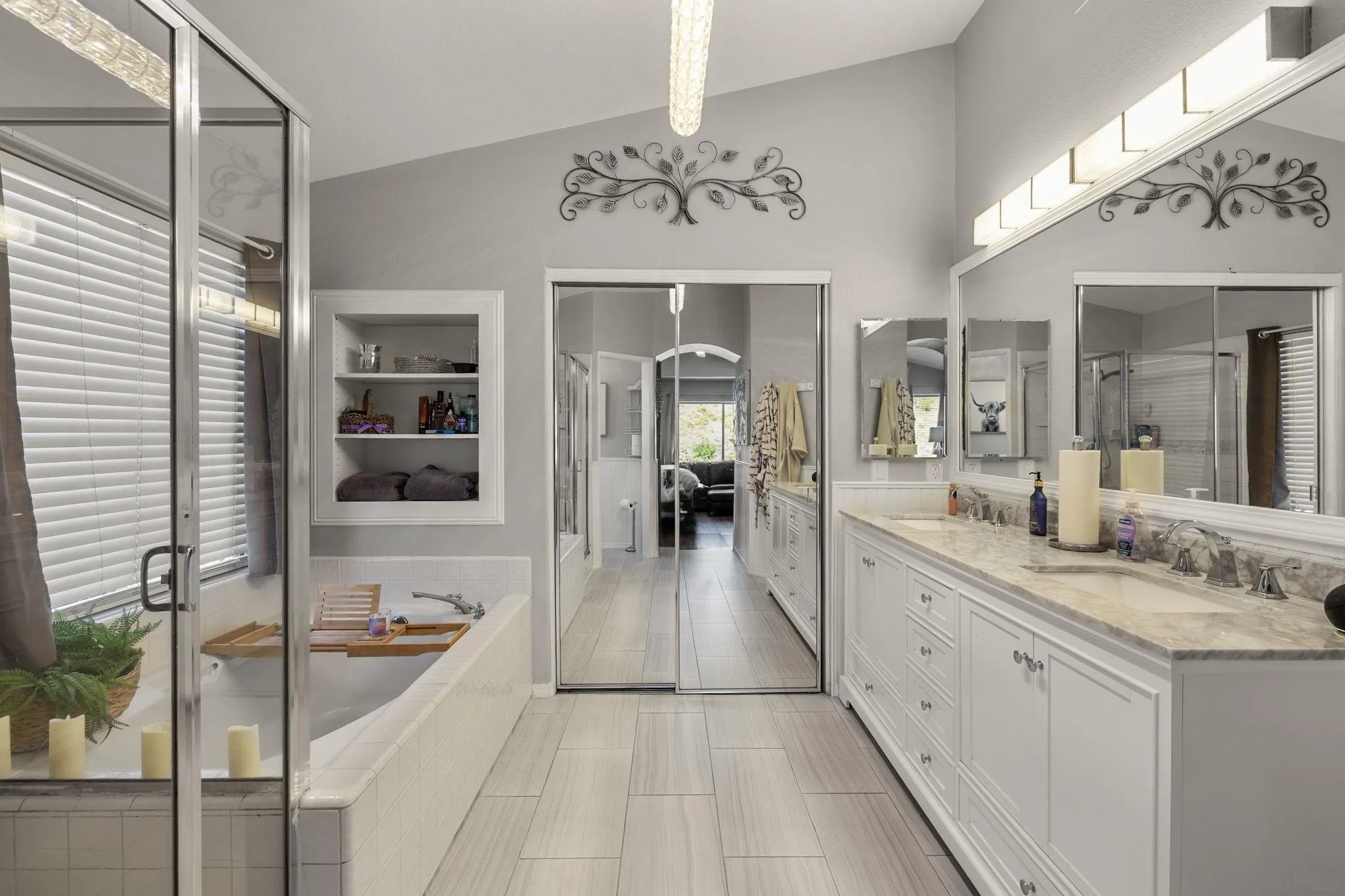 838 Masters Drive Oceanside, CA 92057 - Photo 20 of 39 a en suite bathroom with a granite countertop sink mirror and bathtub