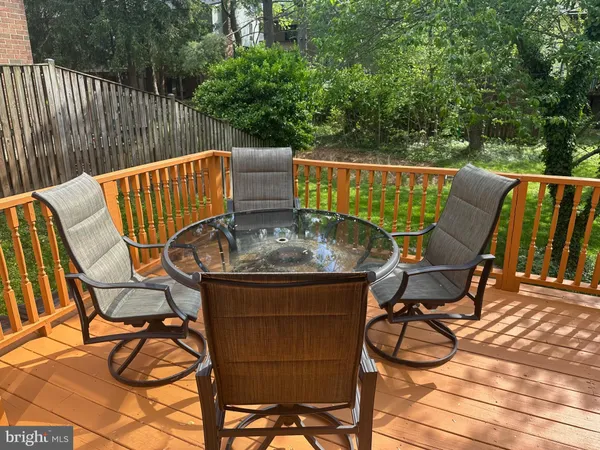 a view of balcony with chairs