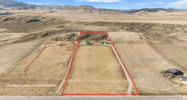 18573 South Marsh Valley Road Downey, ID 83234 - Photo 31 of 32 Aerial view of sparsely populated area featuring mountains and property boundaries highlighted