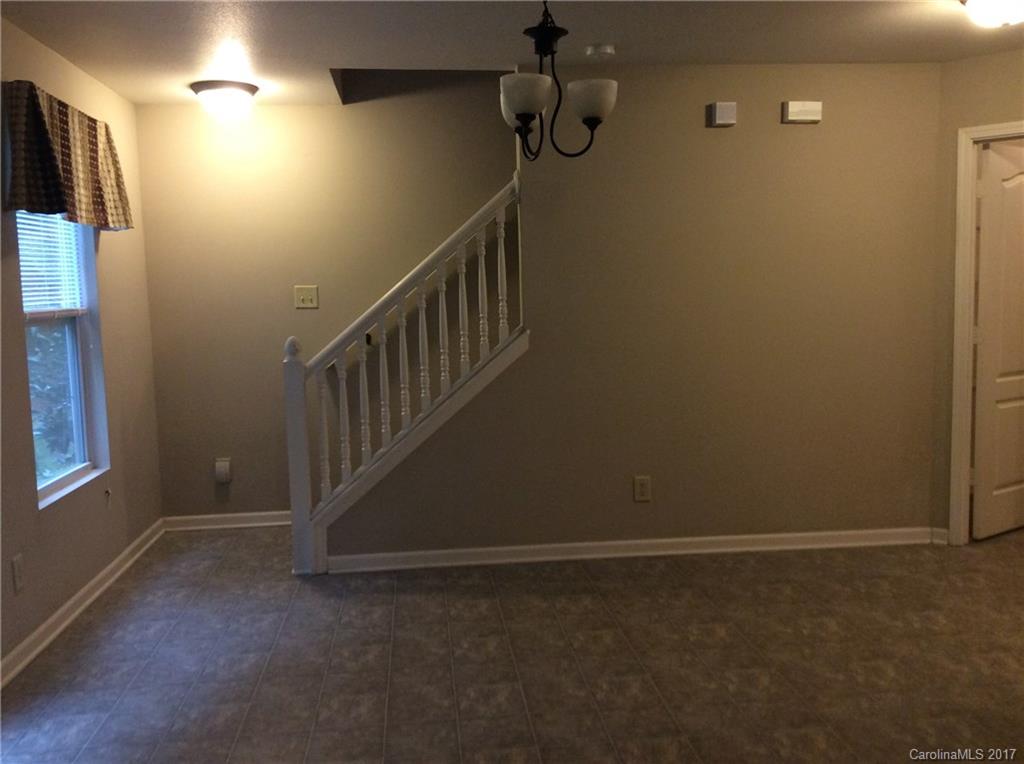 5409 Idlewild Road North Charlotte, NC 28227 - Photo 4 of 10 a view of hallway with stairs