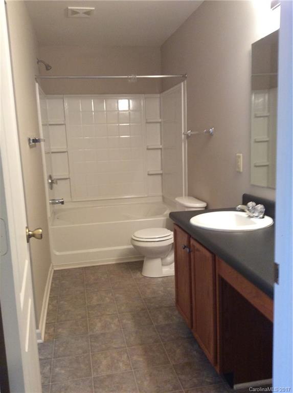 5409 Idlewild Road North Charlotte, NC 28227 - Photo 10 of 10 a bathroom with a sink a toilet and shower