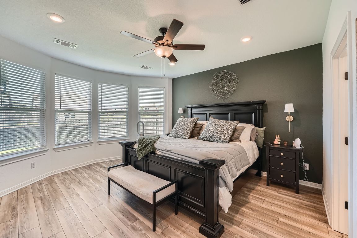 321 Georgia Lace Trail Georgetown, TX 78626 - Photo 13 of 28 Bedroom with light wood finished floors, a ceiling fan, and recessed lighting