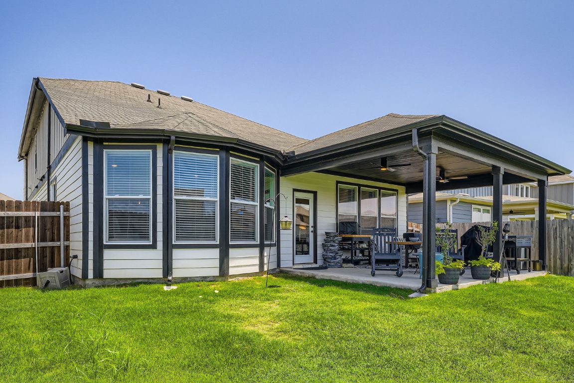 321 Georgia Lace Trail Georgetown, TX 78626 - Photo 26 of 28 Back of property with a patio and ceiling fan