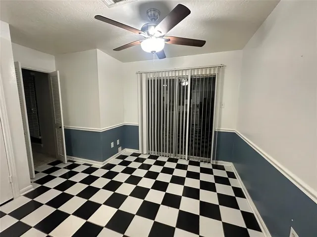 a front view of house with yard and trees