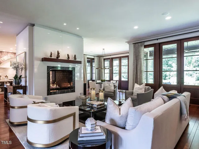 a room with a large bed and a large window