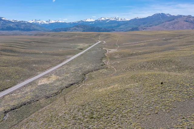 a view of ocean and mountain