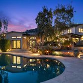 a view of a house with a swimming pool