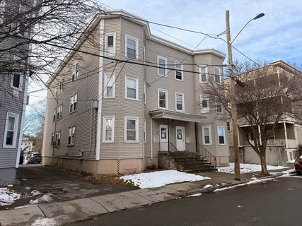 a brick building with a large windows