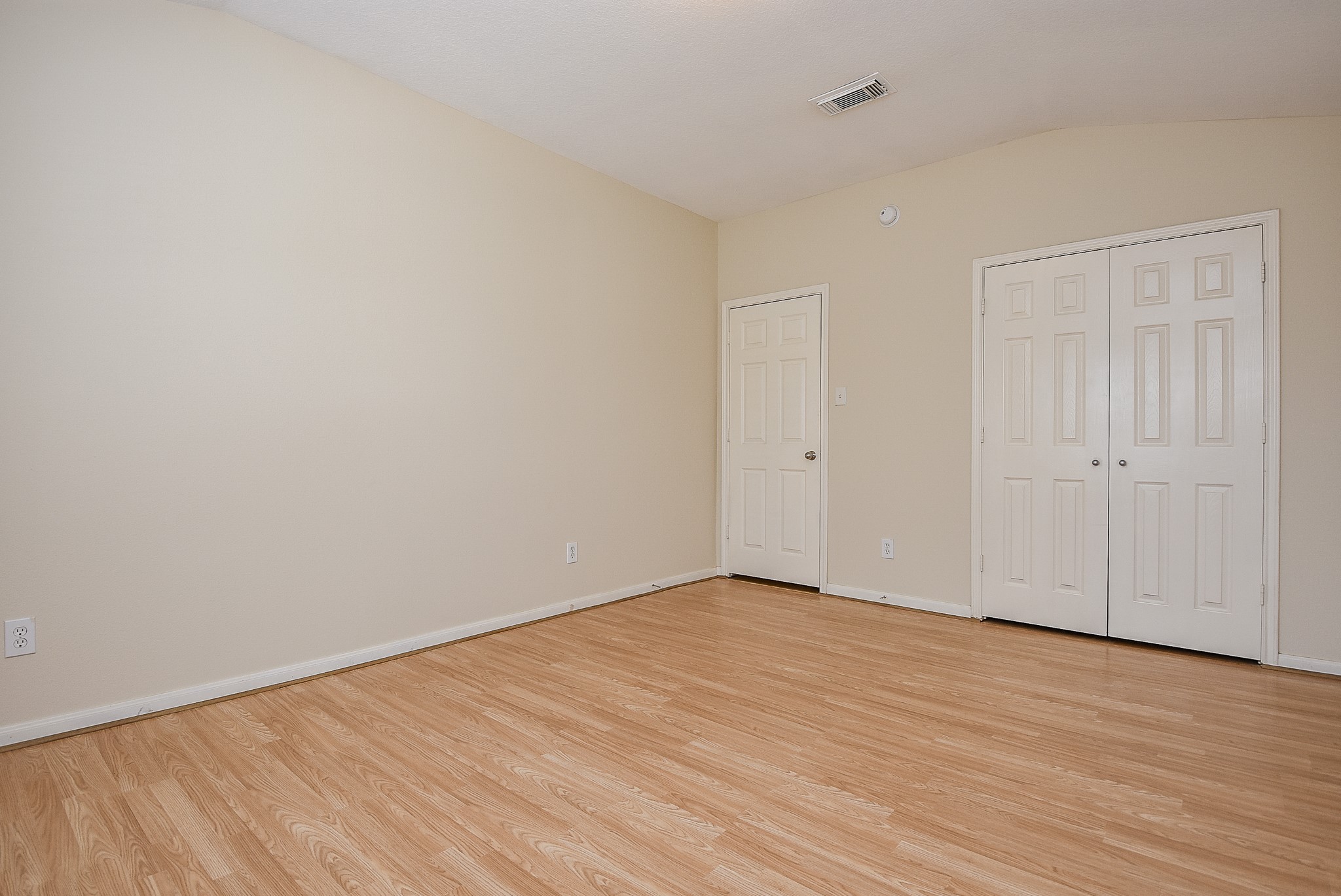 23527 Maple View Drive Spring, TX 77373 - Photo 19 of 25 a view of an empty room with wooden floor