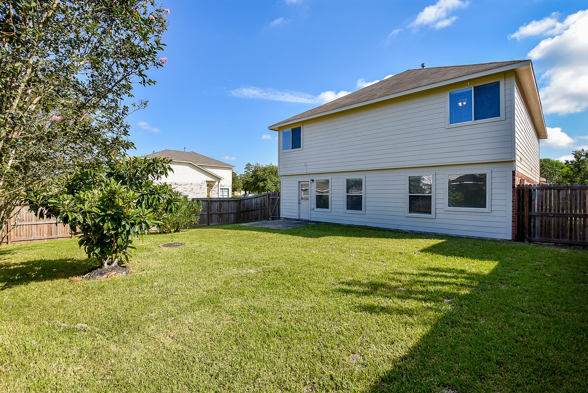 23527 Maple View Drive Spring, TX 77373 - Photo 24 of 25 a front view of house with yard and green space