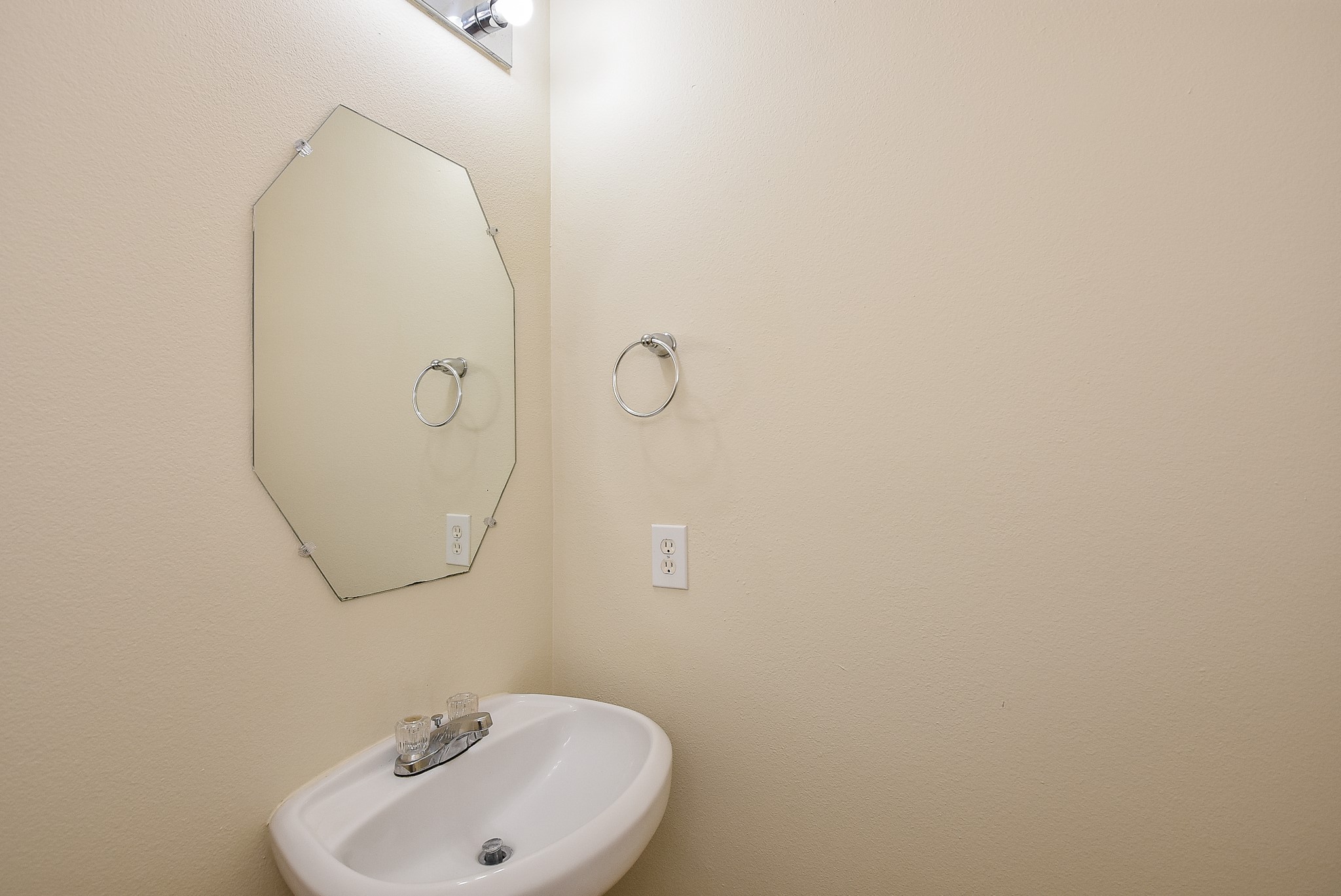 23527 Maple View Drive Spring, TX 77373 - Photo 6 of 25 a bathroom with a sink and mirror
