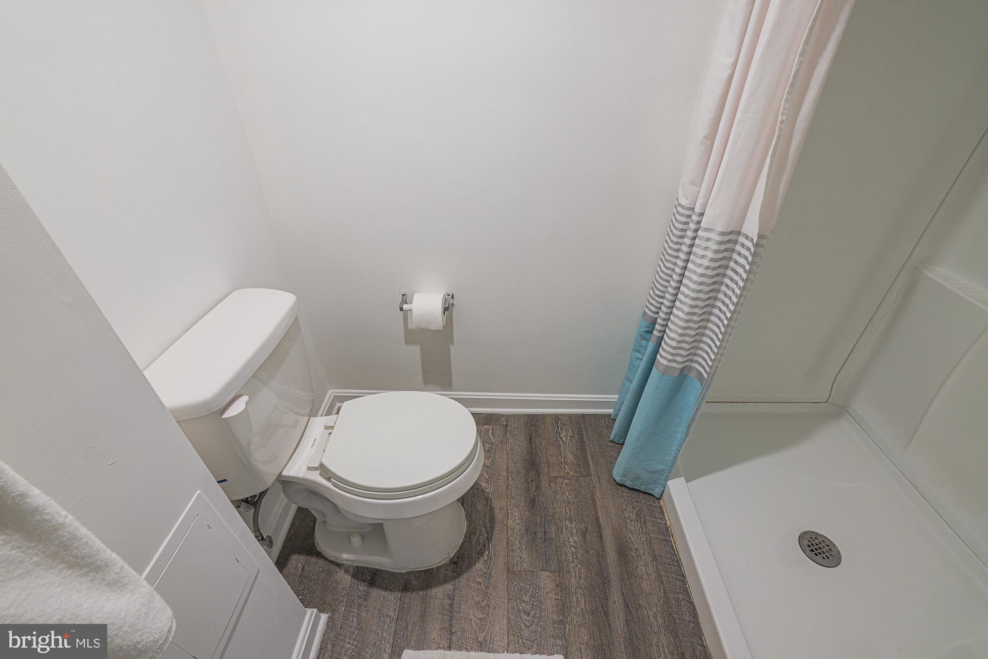 410 Kingston Road Baltimore, MD 21229 - Photo 42 of 56 Full basement bathroom with shower stall