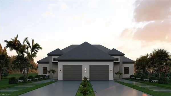 front view of a house with a yard