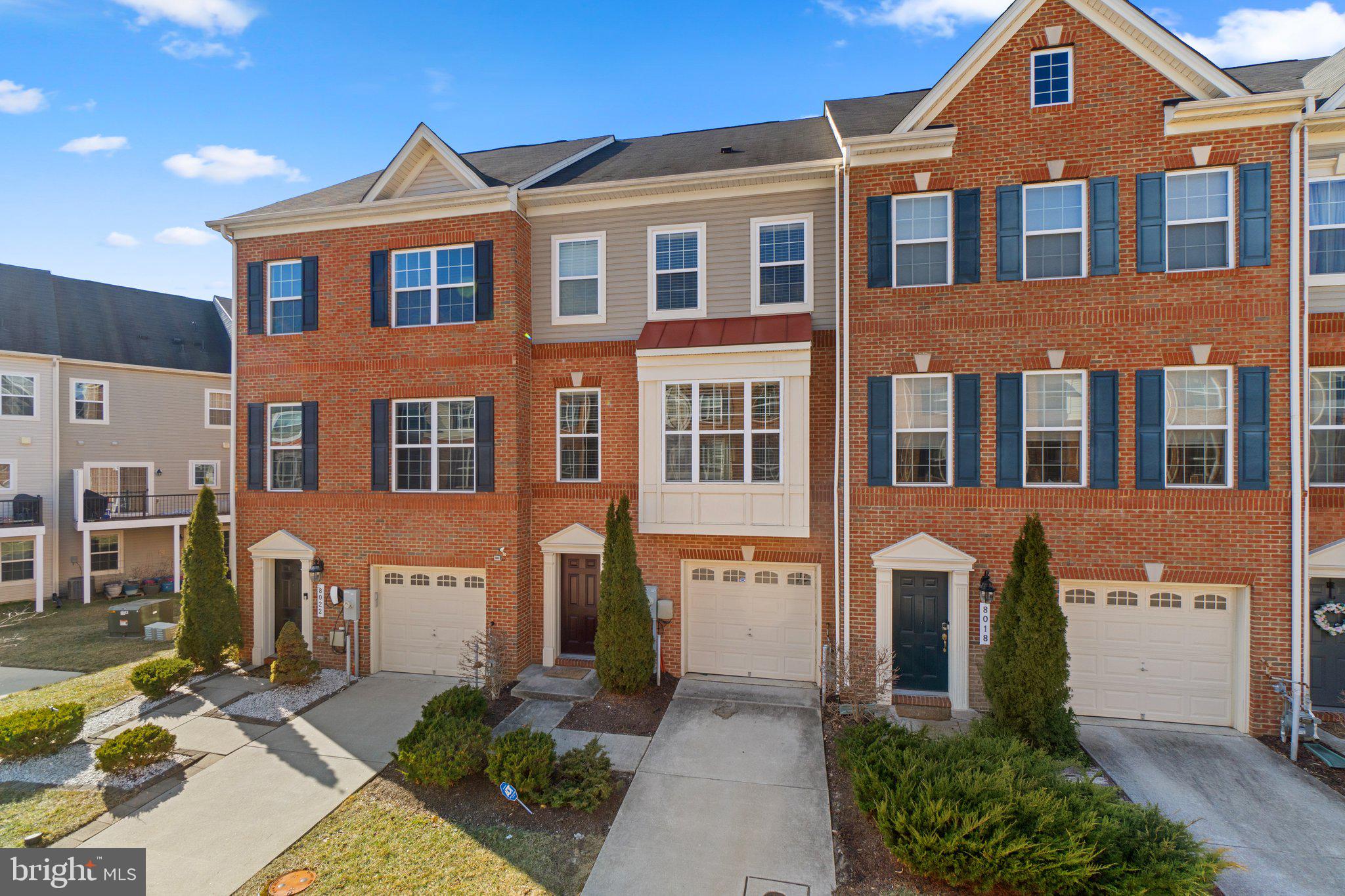 8020 Ravenclaw Road Elkridge, MD 21075 - Photo 2 of 38 a front view of a house with a yard
