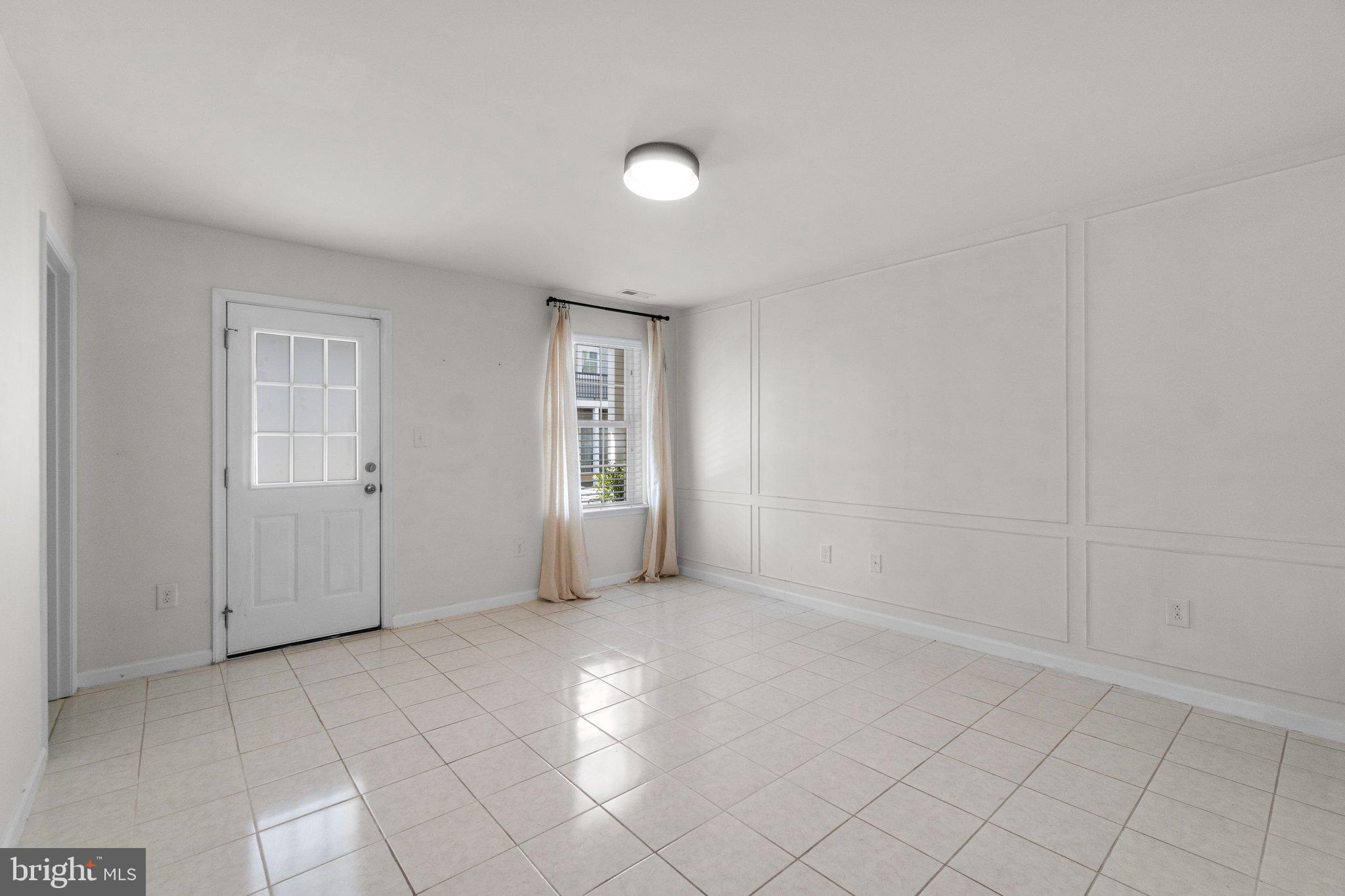 8020 Ravenclaw Road Elkridge, MD 21075 - Photo 26 of 38 an empty room with windows