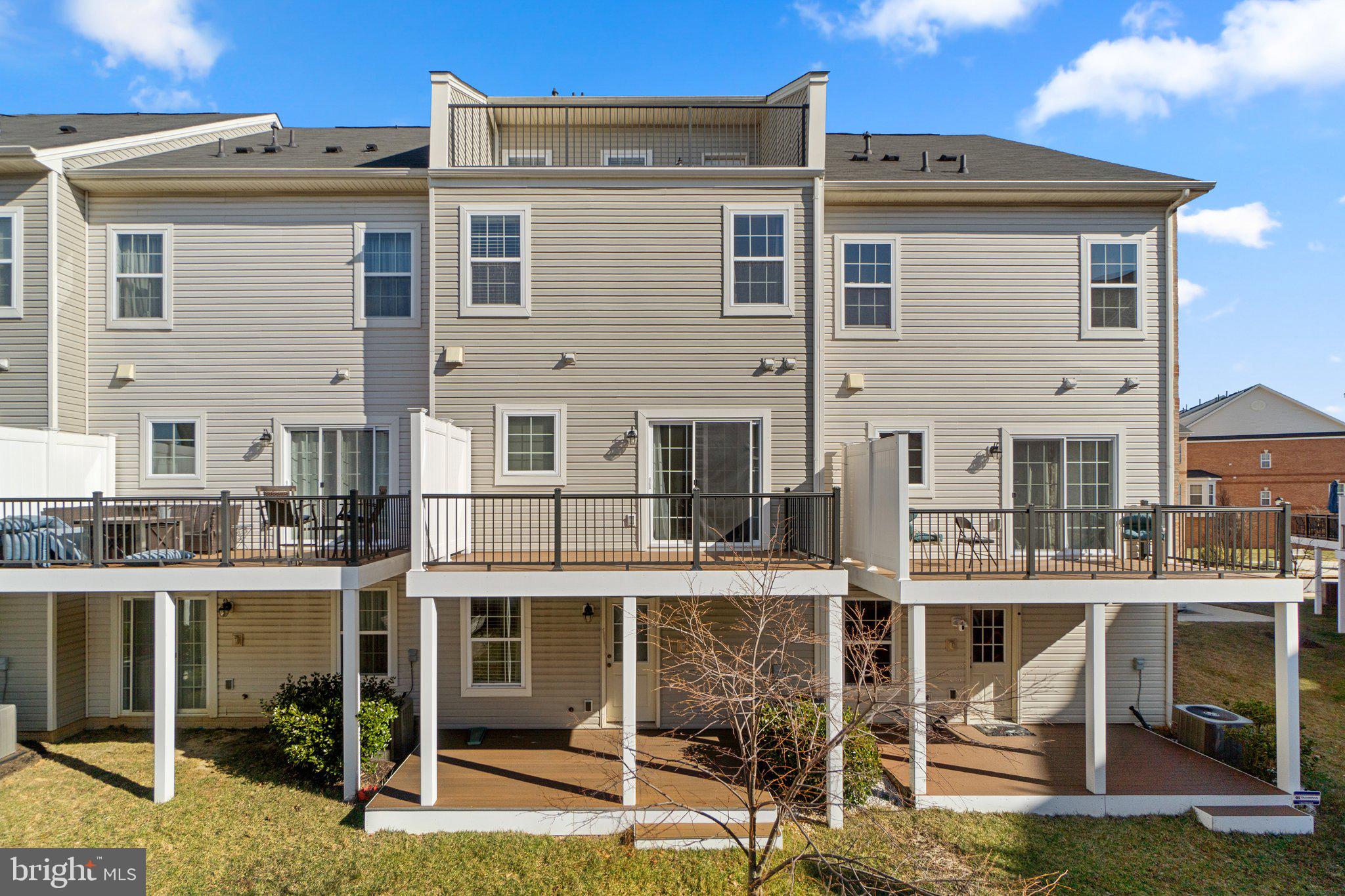 8020 Ravenclaw Road Elkridge, MD 21075 - Photo 33 of 38 a view of a large building with a swimming pool