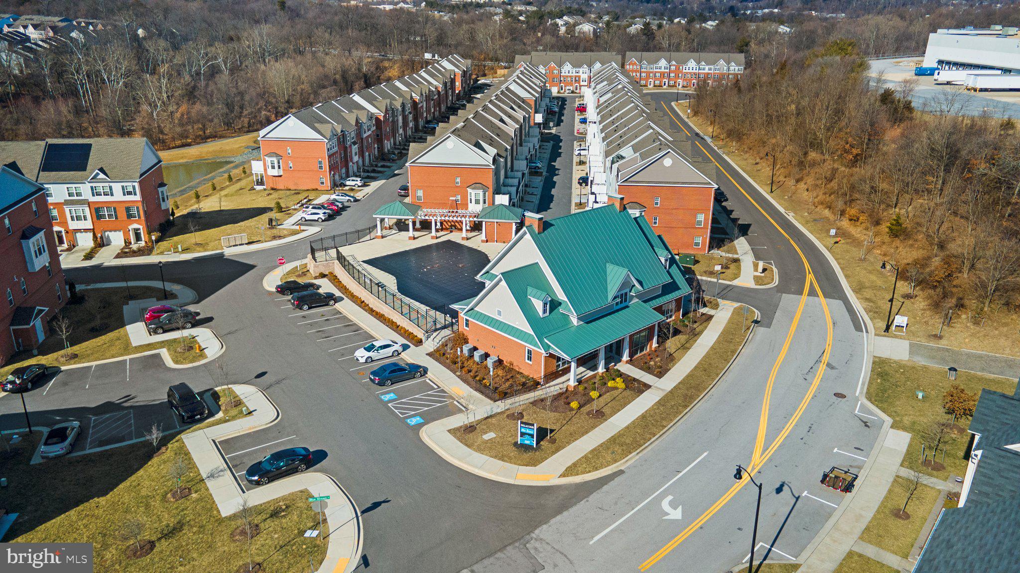 8020 Ravenclaw Road Elkridge, MD 21075 - Photo 37 of 38 an aerial view of residential houses with outdoor space