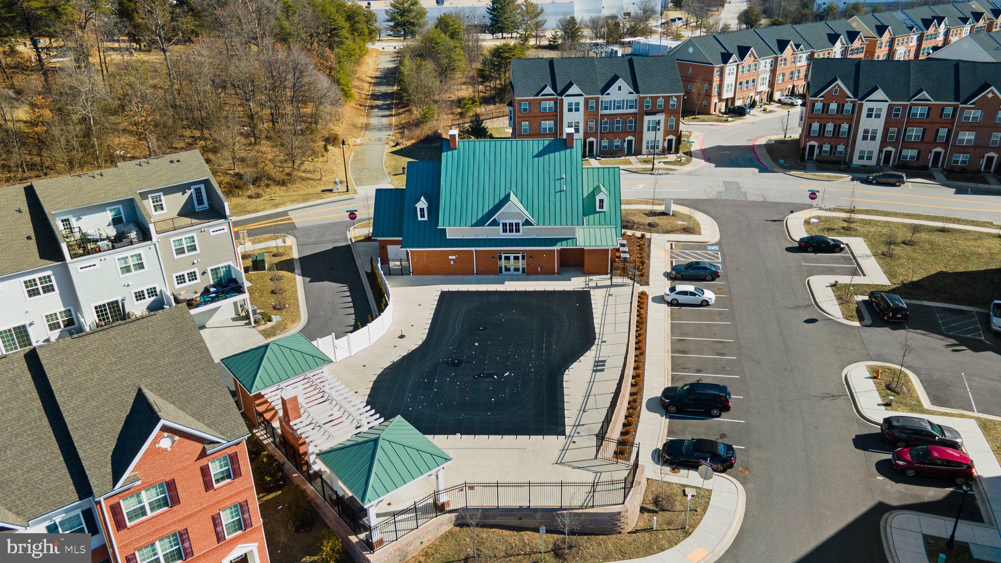 8020 Ravenclaw Road Elkridge, MD 21075 - Photo 38 of 38 an aerial view of multiple houses with outdoor space