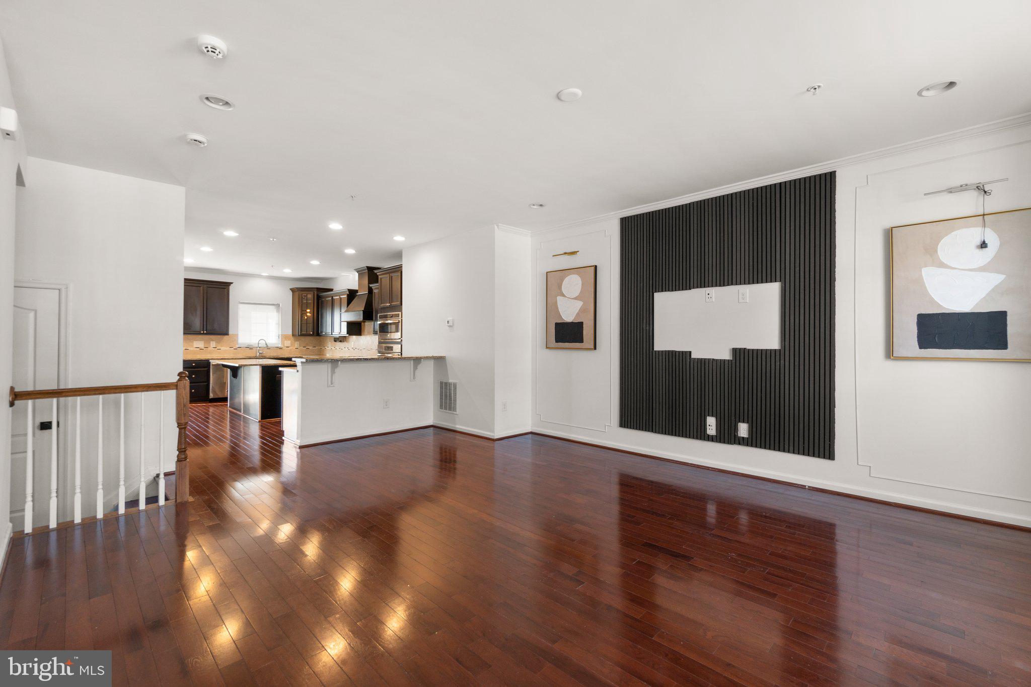 8020 Ravenclaw Road Elkridge, MD 21075 - Photo 5 of 38 a view of kitchen with furniture and wooden floor