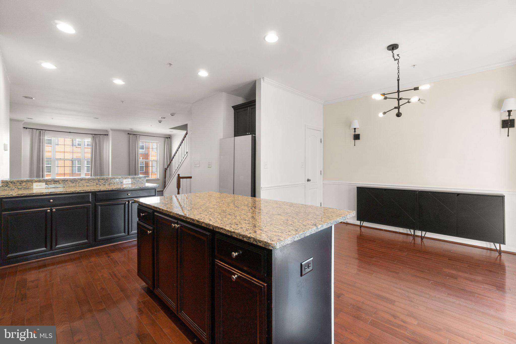 8020 Ravenclaw Road Elkridge, MD 21075 - Photo 7 of 38 a kitchen with granite countertop counter top space and cabinets