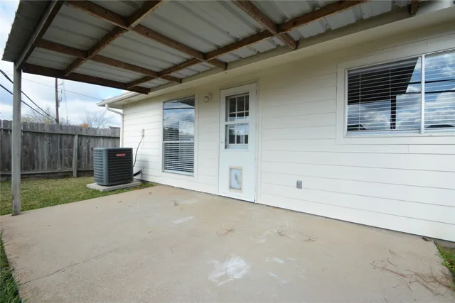 a view of a backyard of the house