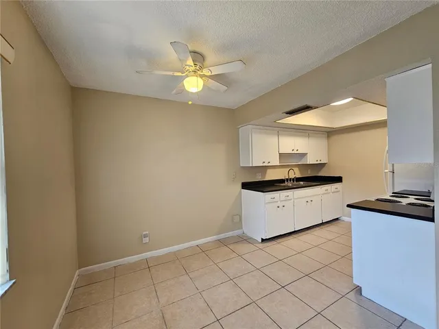 a kitchen with a cabinets and appliances