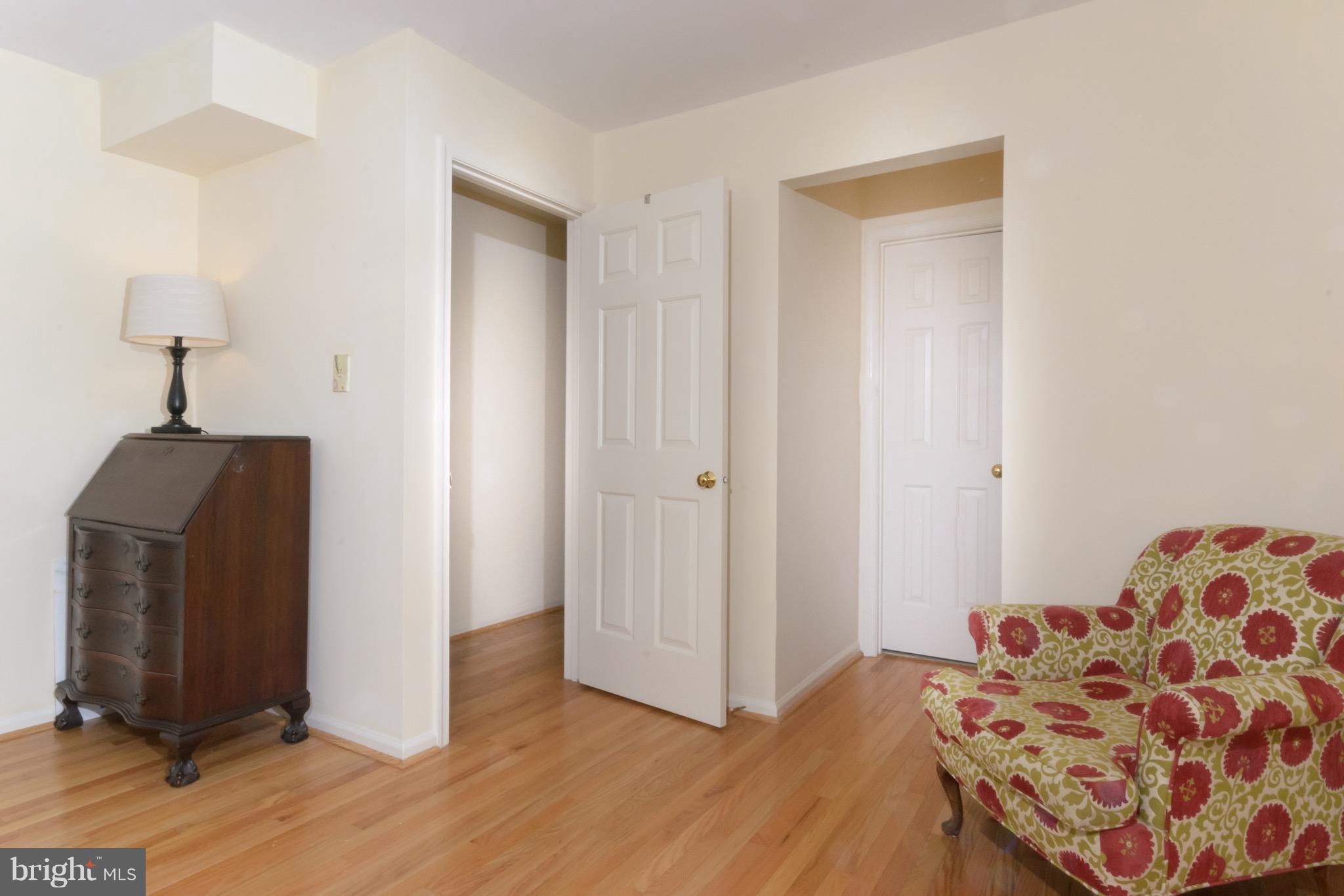 428 West Glebe Road Alexandria, VA 22305 - Photo 12 of 25 a bedroom with a bed and a mirror
