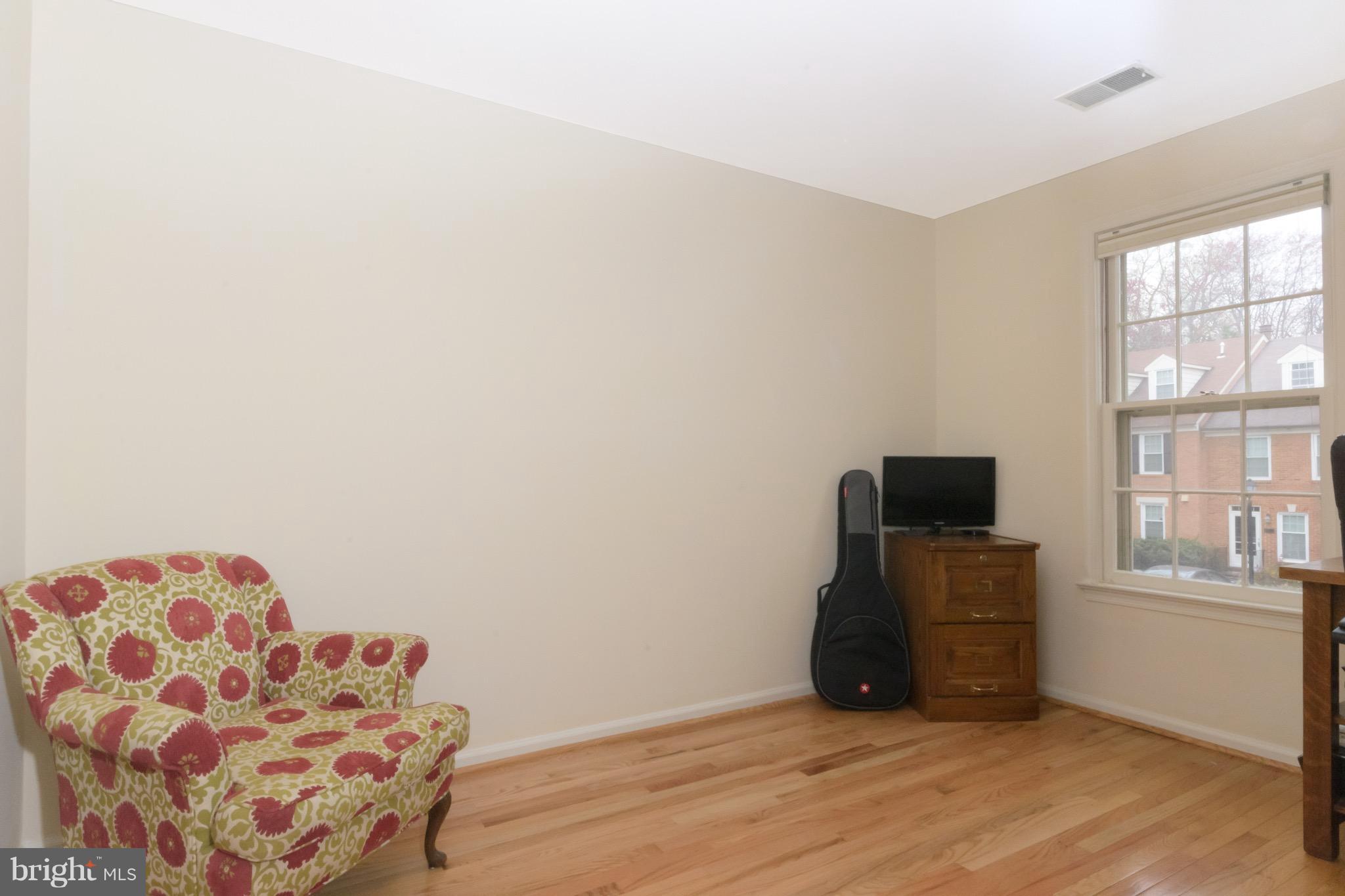 428 West Glebe Road Alexandria, VA 22305 - Photo 13 of 25 a view of workspace with window and wooden floor
