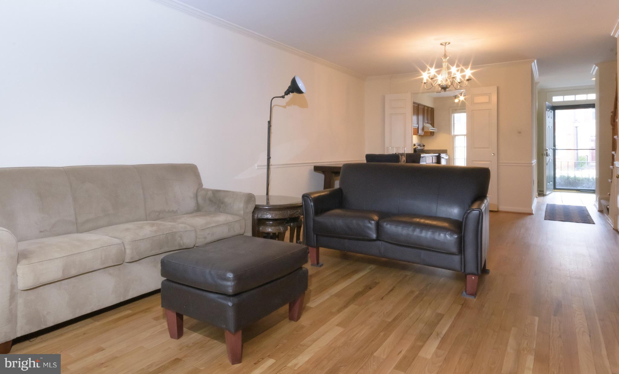 428 West Glebe Road Alexandria, VA 22305 - Photo 3 of 25 a living room with furniture and a wooden floor