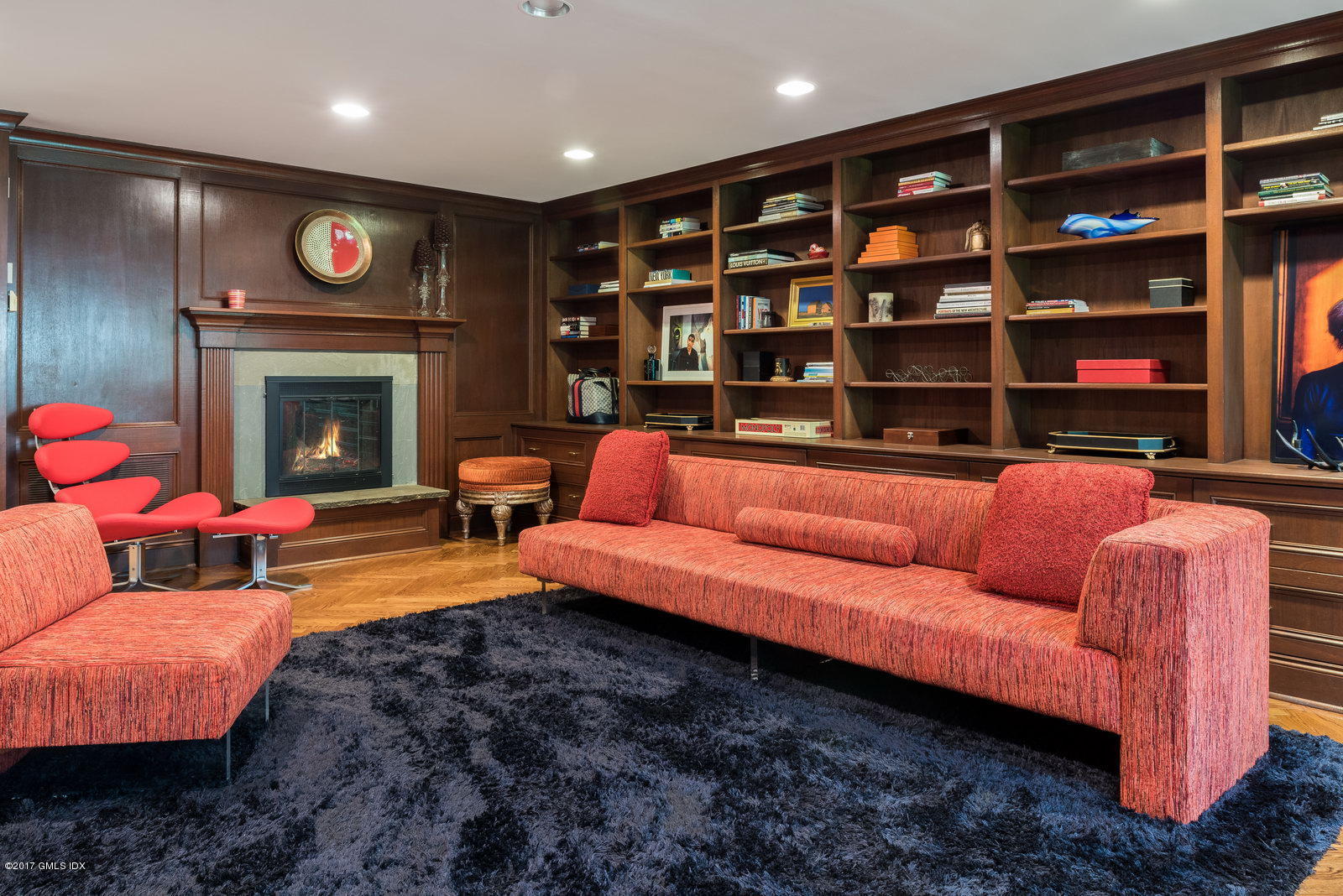 25 Windabout Drive Greenwich, CT 06831 - Photo 11 of 31 a living room with furniture and a fireplace