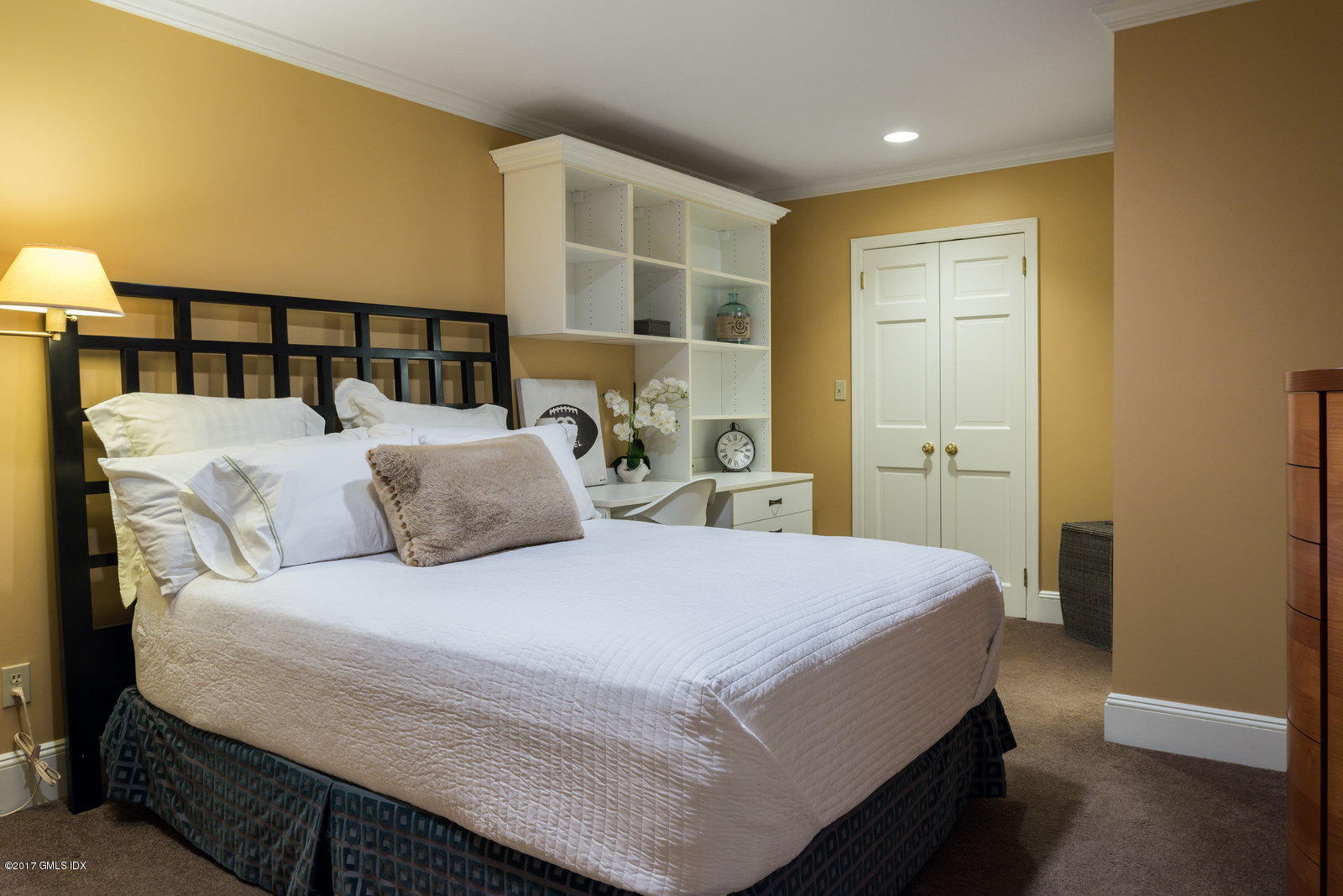 25 Windabout Drive Greenwich, CT 06831 - Photo 17 of 31 a bedroom with a bed and a window