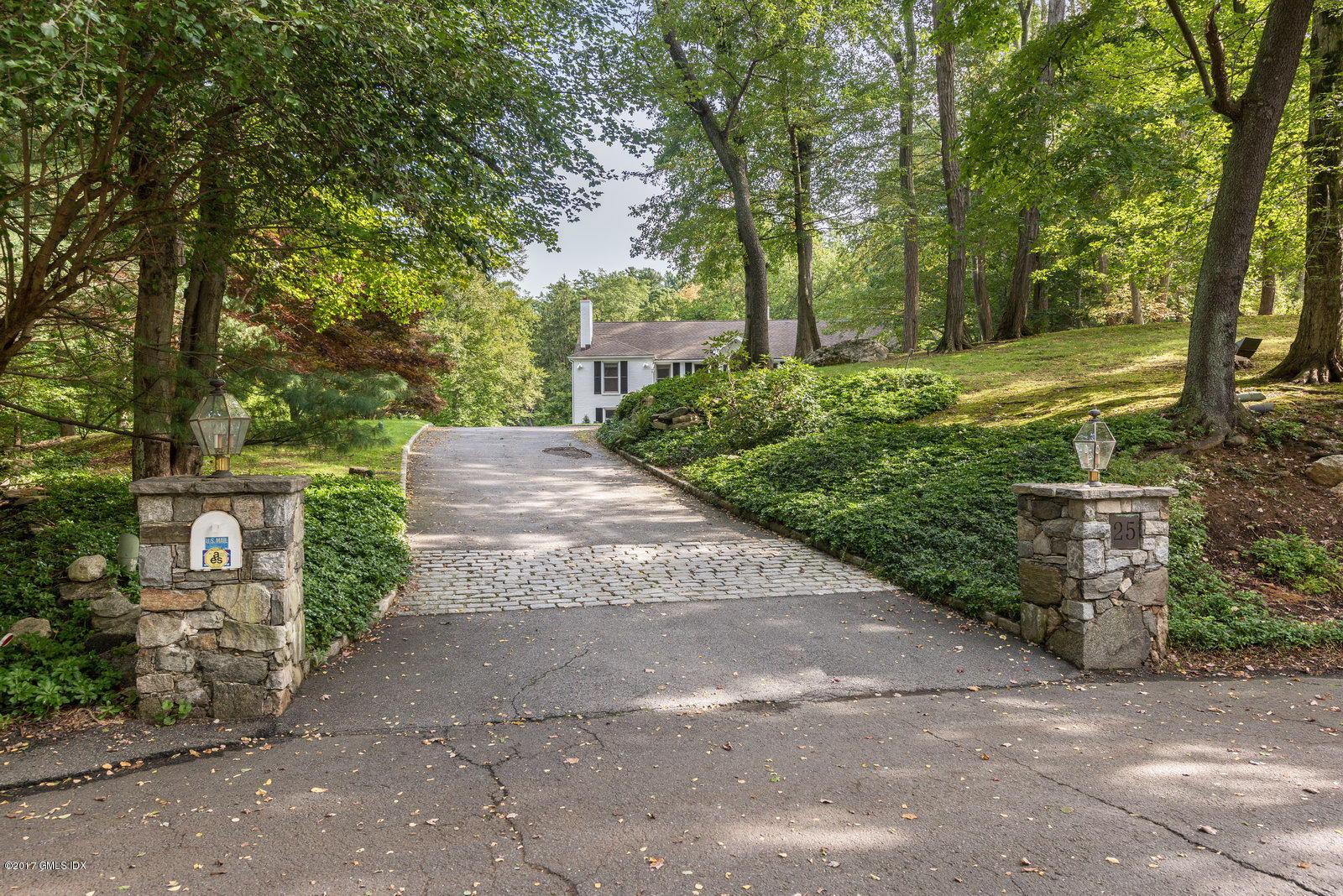 25 Windabout Drive Greenwich, CT 06831 - Photo 19 of 31 a view of a street with large trees