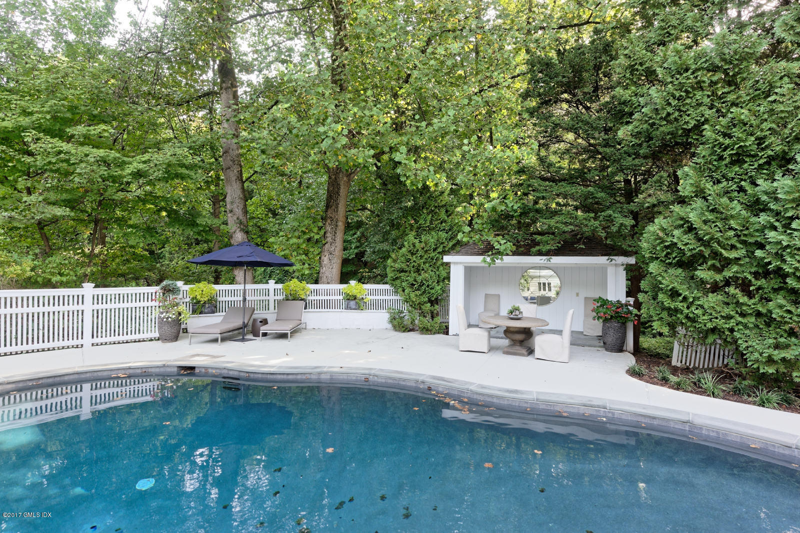 25 Windabout Drive Greenwich, CT 06831 - Photo 25 of 31 an outdoor space with pool and furniture