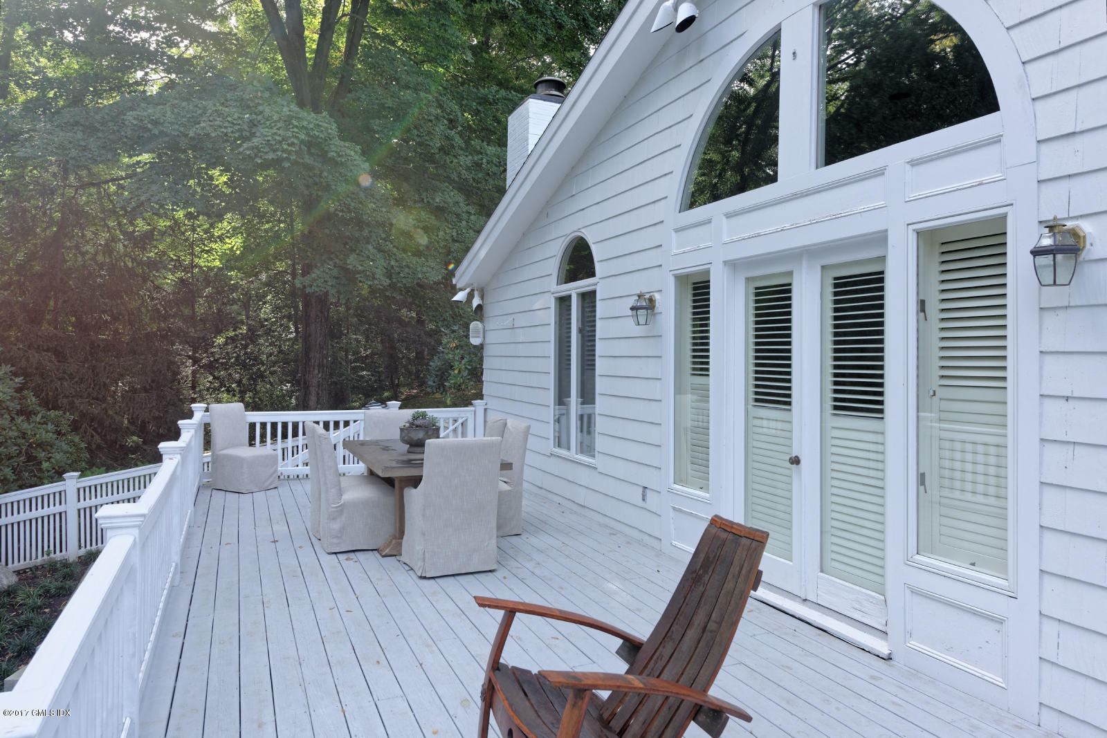 25 Windabout Drive Greenwich, CT 06831 - Photo 30 of 31 a view of deck with furniture and trees