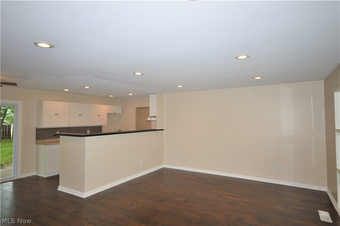 6468 Sherborn Road Parma Heights, OH 44130 - Photo 11 of 26 Spacious family room with open concept, new recessed lighting, flooring, and trim!
