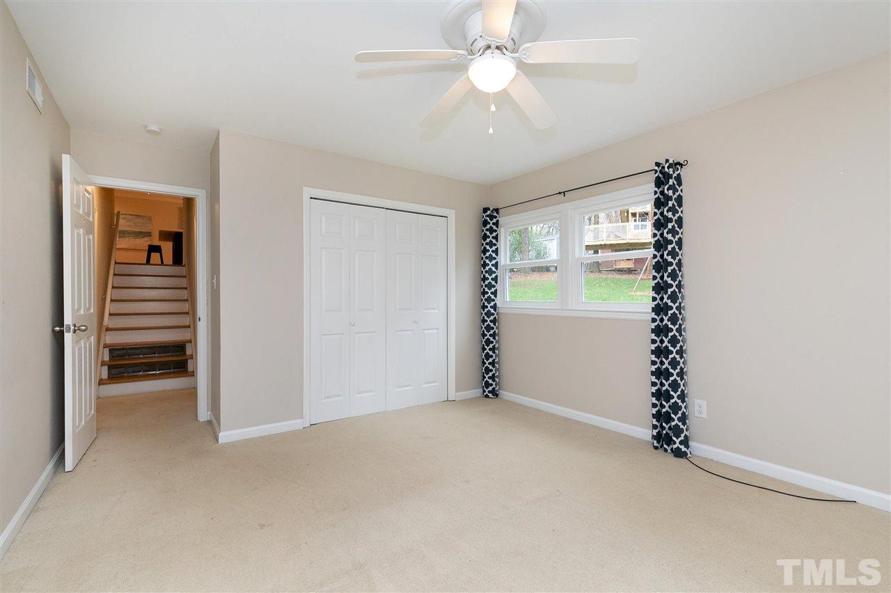 6509 Wrenwood Avenue Raleigh, NC 27607 - Photo 17 of 29 a view of an empty room with a window
